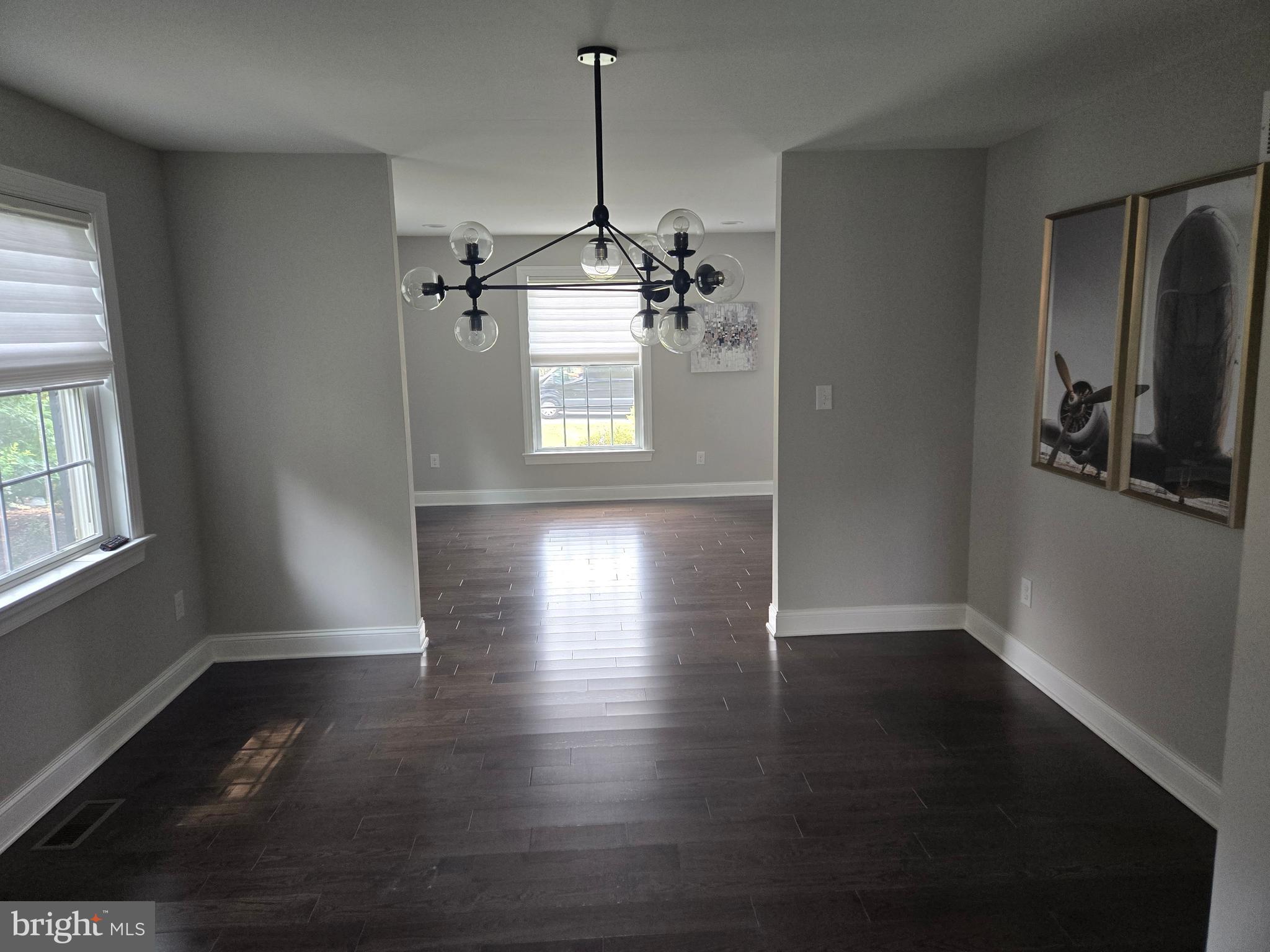 145 East Golf View Road Ardmore, PA 19003 - Photo 36 of 103 an empty room with wooden floor windows and entryway