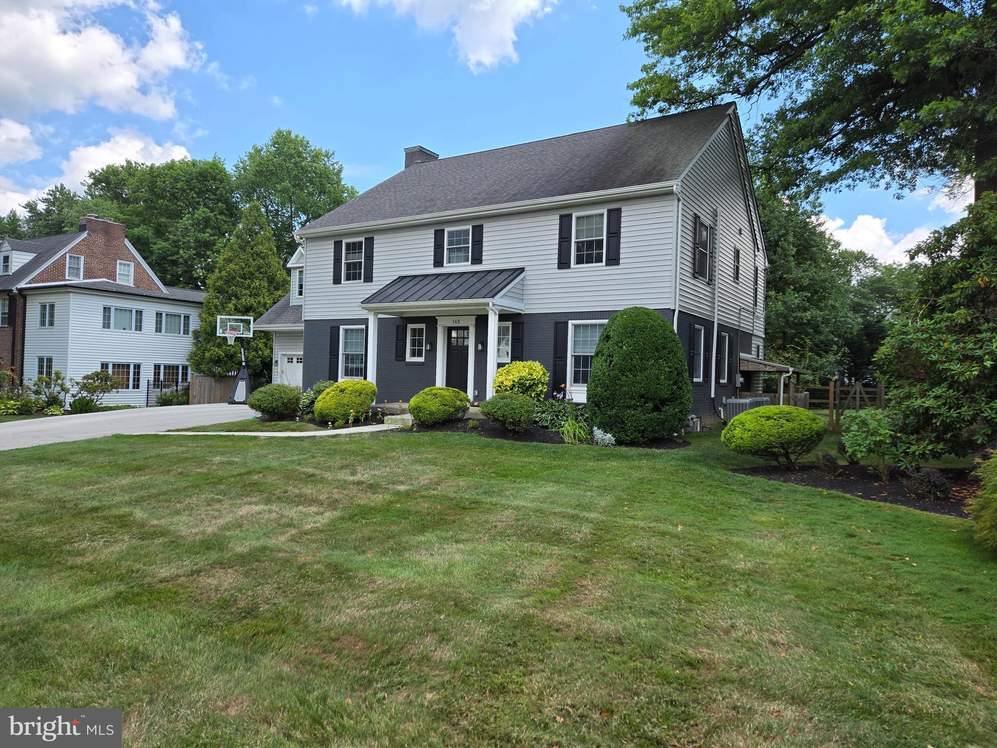 145 East Golf View Road Ardmore, PA 19003 - Photo 4 of 103 a front view of a house with a garden
