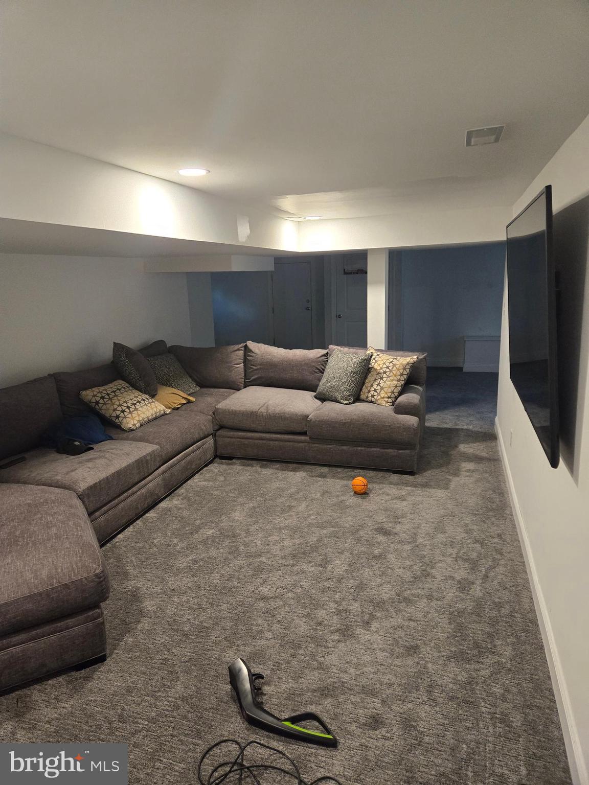 145 East Golf View Road Ardmore, PA 19003 - Photo 44 of 103 a living room with furniture and a flat screen tv