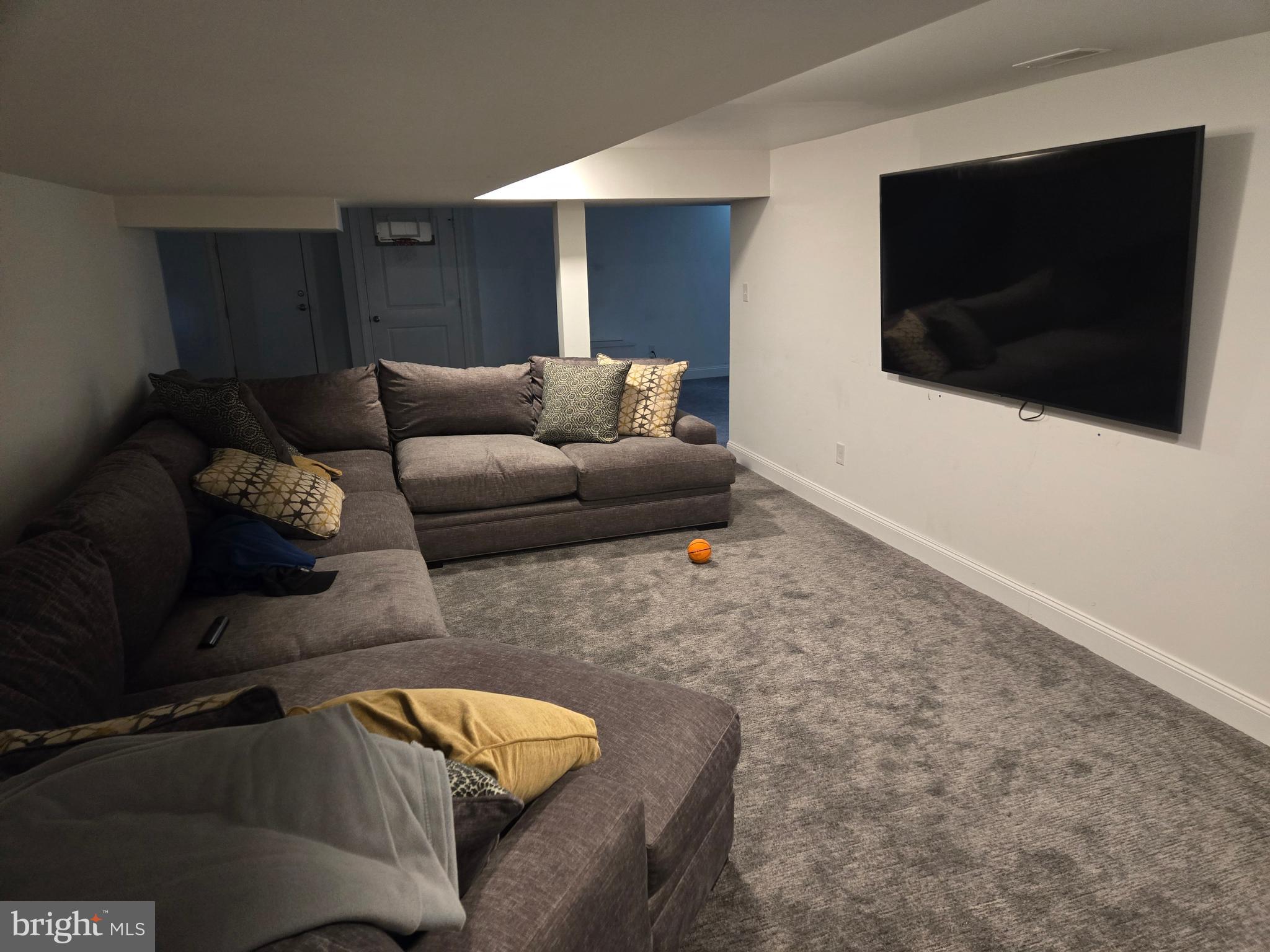 145 East Golf View Road Ardmore, PA 19003 - Photo 49 of 103 a living room with furniture and a flat screen tv