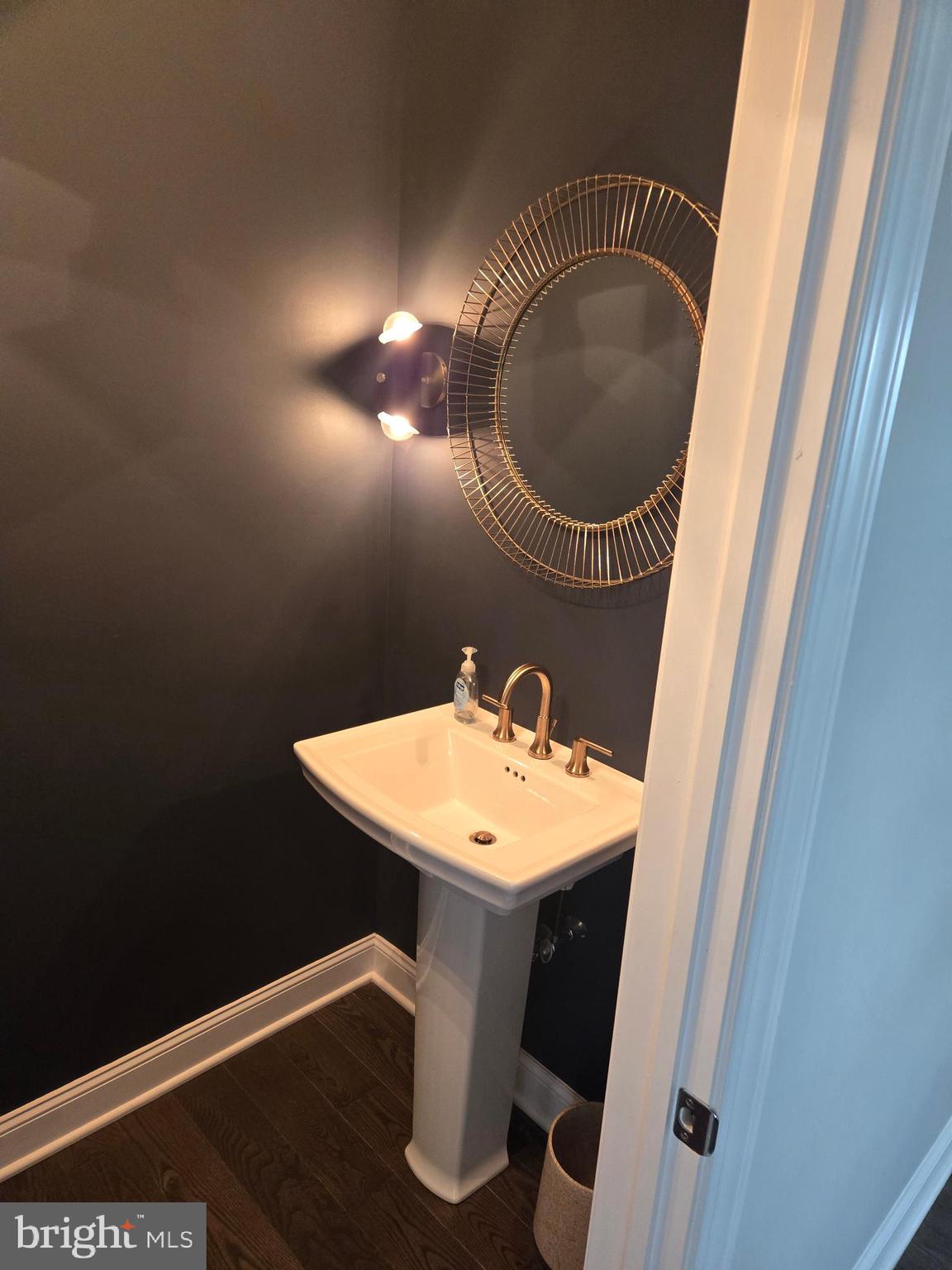 145 East Golf View Road Ardmore, PA 19003 - Photo 61 of 103 a bathroom with a sink and mirror