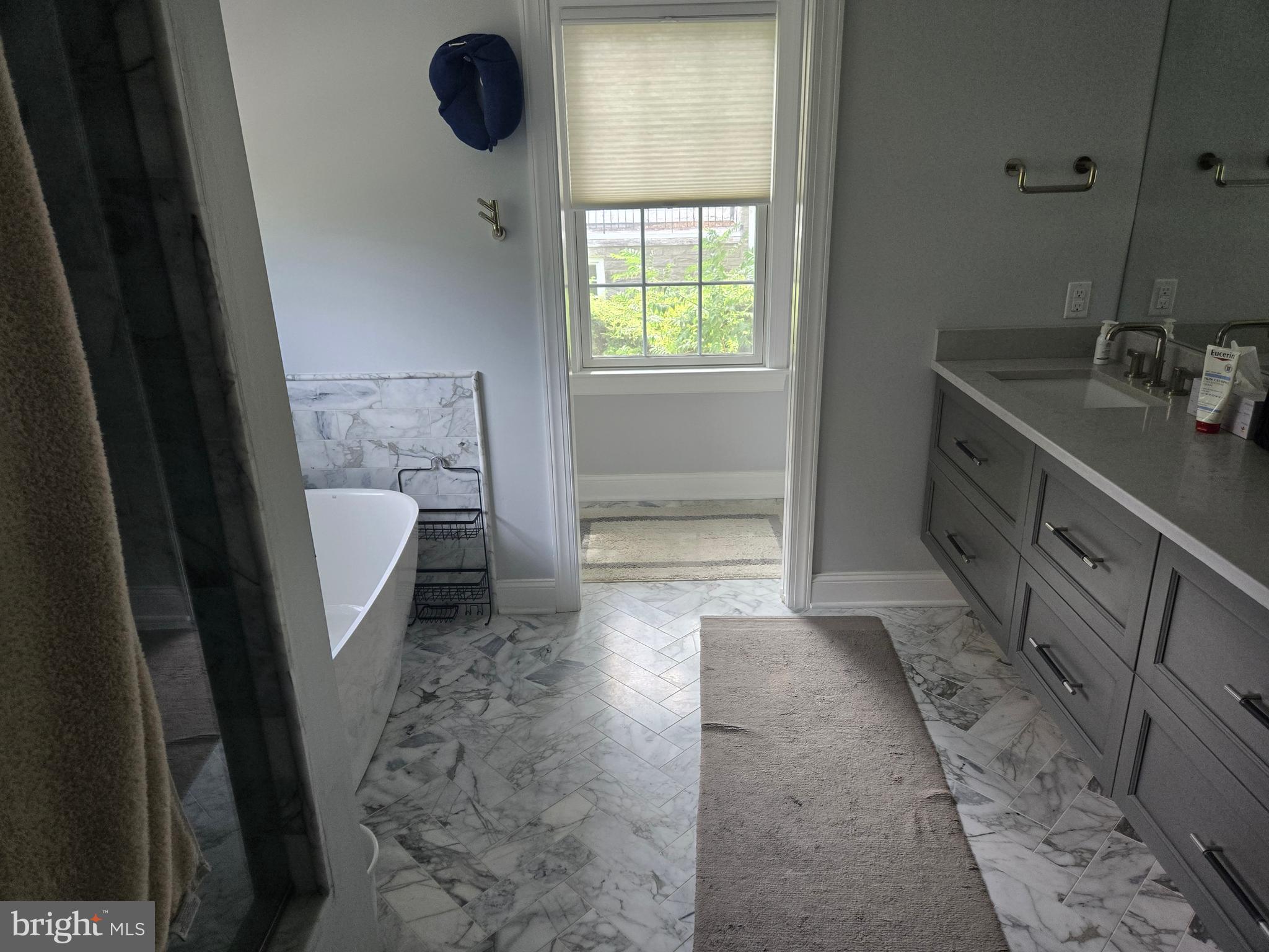 145 East Golf View Road Ardmore, PA 19003 - Photo 74 of 103 a bathroom with a sink a toilet and shower