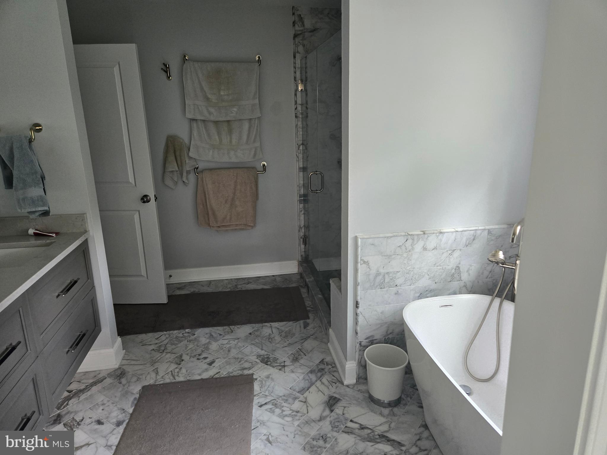 145 East Golf View Road Ardmore, PA 19003 - Photo 75 of 103 a bathroom with a granite countertop sink toilet and shower