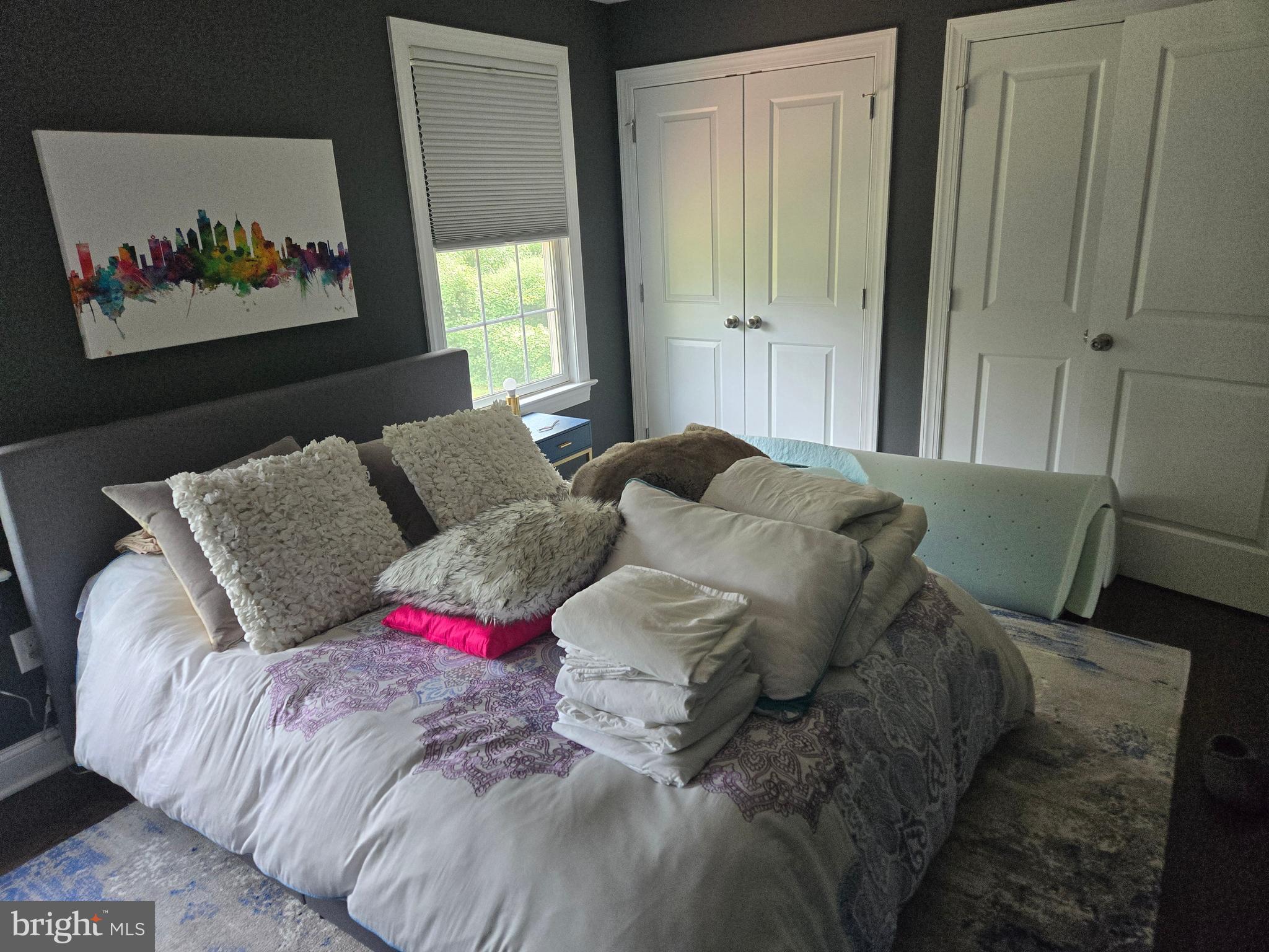 145 East Golf View Road Ardmore, PA 19003 - Photo 81 of 103 a living room with furniture and a painting on the wall