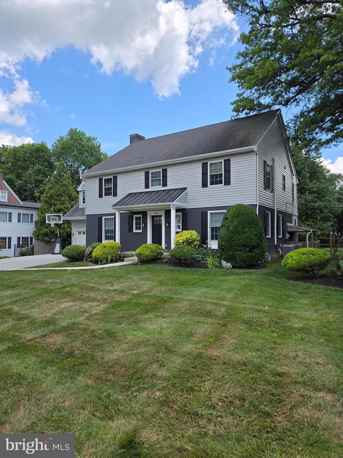 145 East Golf View Road Ardmore, PA 19003 - Photo 9 of 103 a front view of a house with a garden