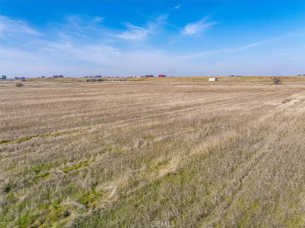a view of an ocean beach and mountain