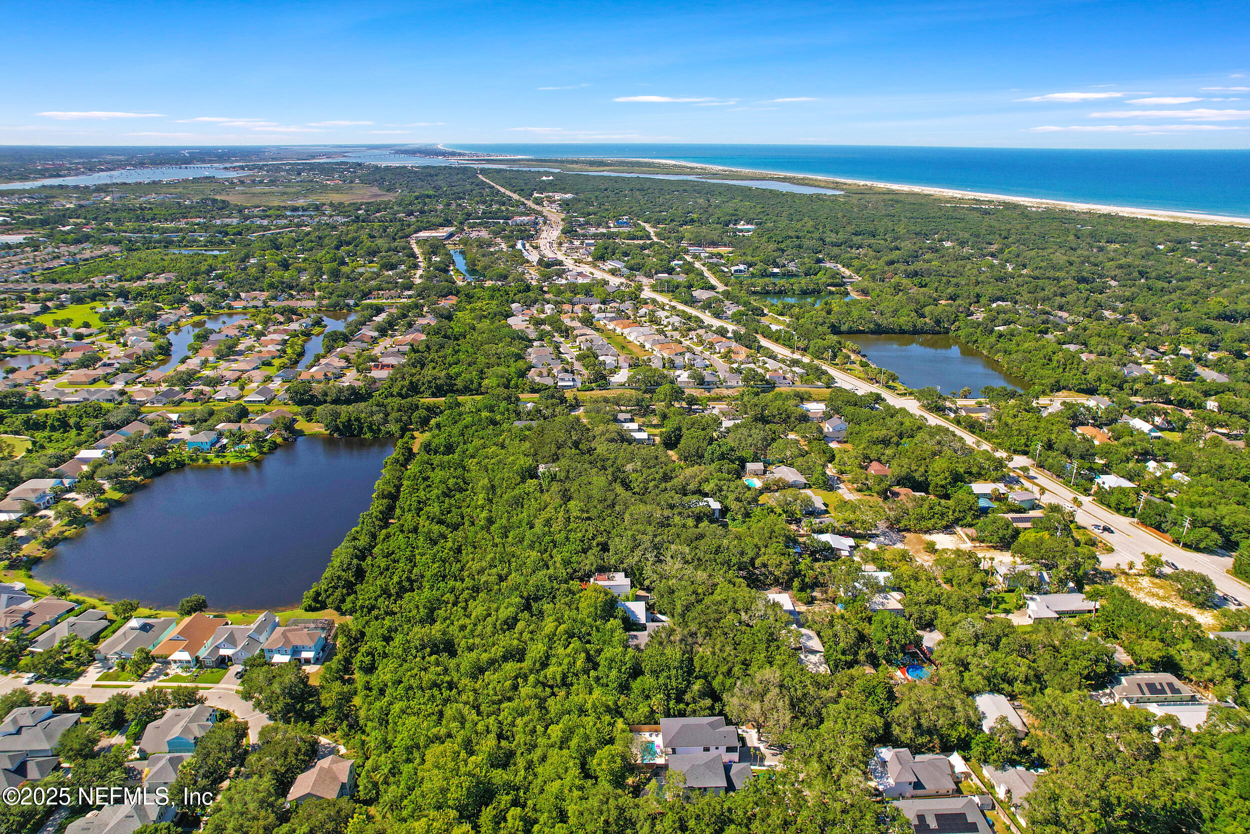 0 Oleander Street St. Augustine, FL 32080 - Photo 14 of 28 an aerial view of residential houses with outdoor space and trees