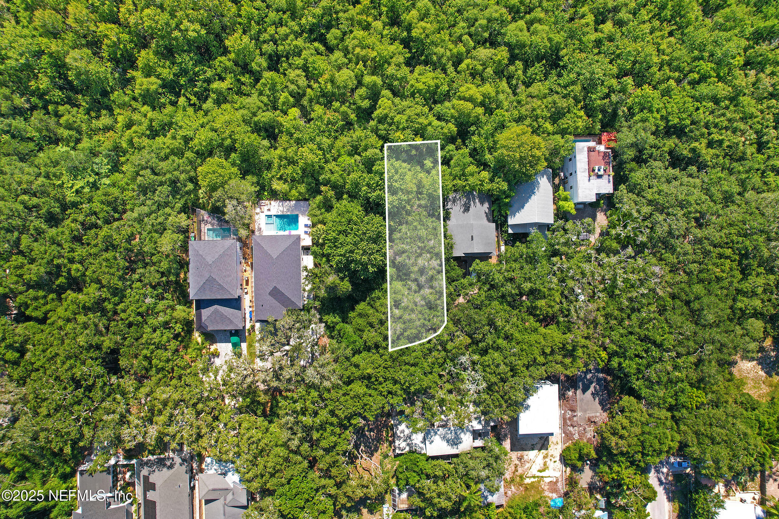 0 Oleander Street St. Augustine, FL 32080 - Photo 19 of 28 an aerial view of a house with a yard and outdoor seating