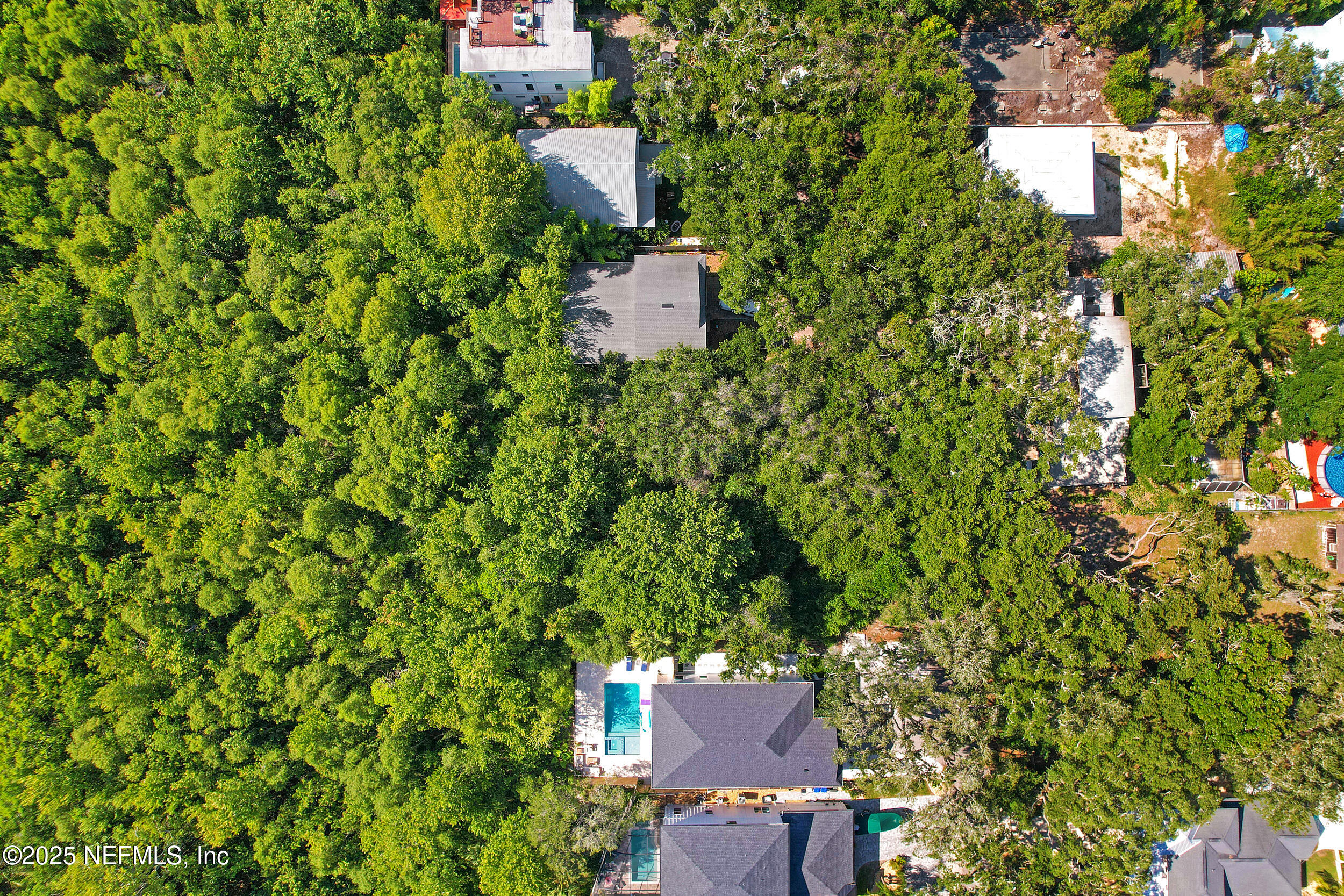 0 Oleander Street St. Augustine, FL 32080 - Photo 22 of 28 an aerial view of a house with a yard and outdoor seating