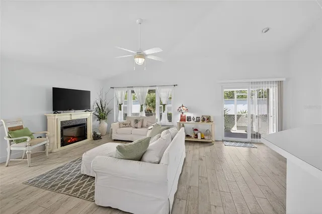 a kitchen that has a sink cabinets and stainless steel appliances