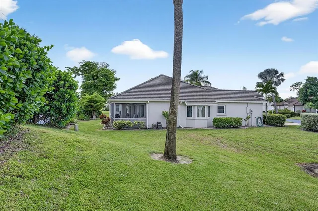 a backyard of a house with lots of green space
