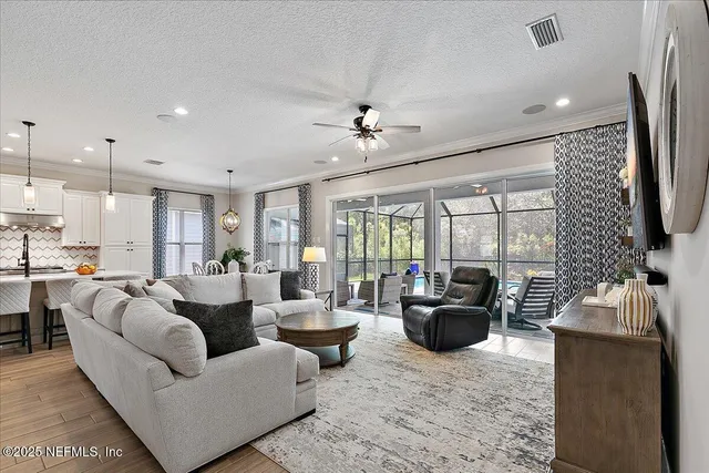 a bathroom with a sink toilet and window