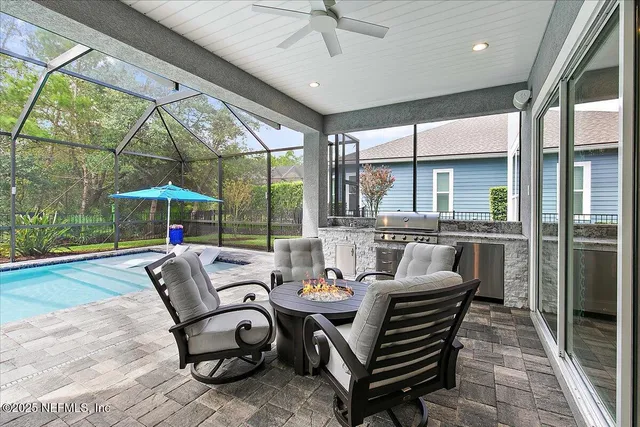 an aerial view of residential houses with outdoor space