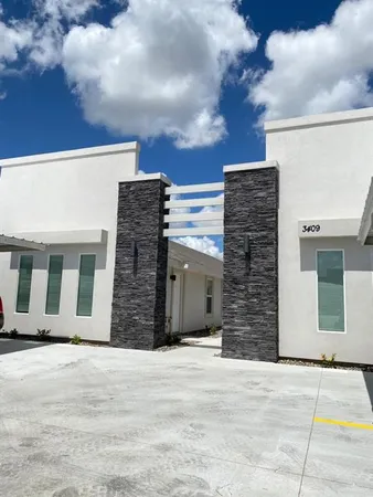 a view of an house with backyard space