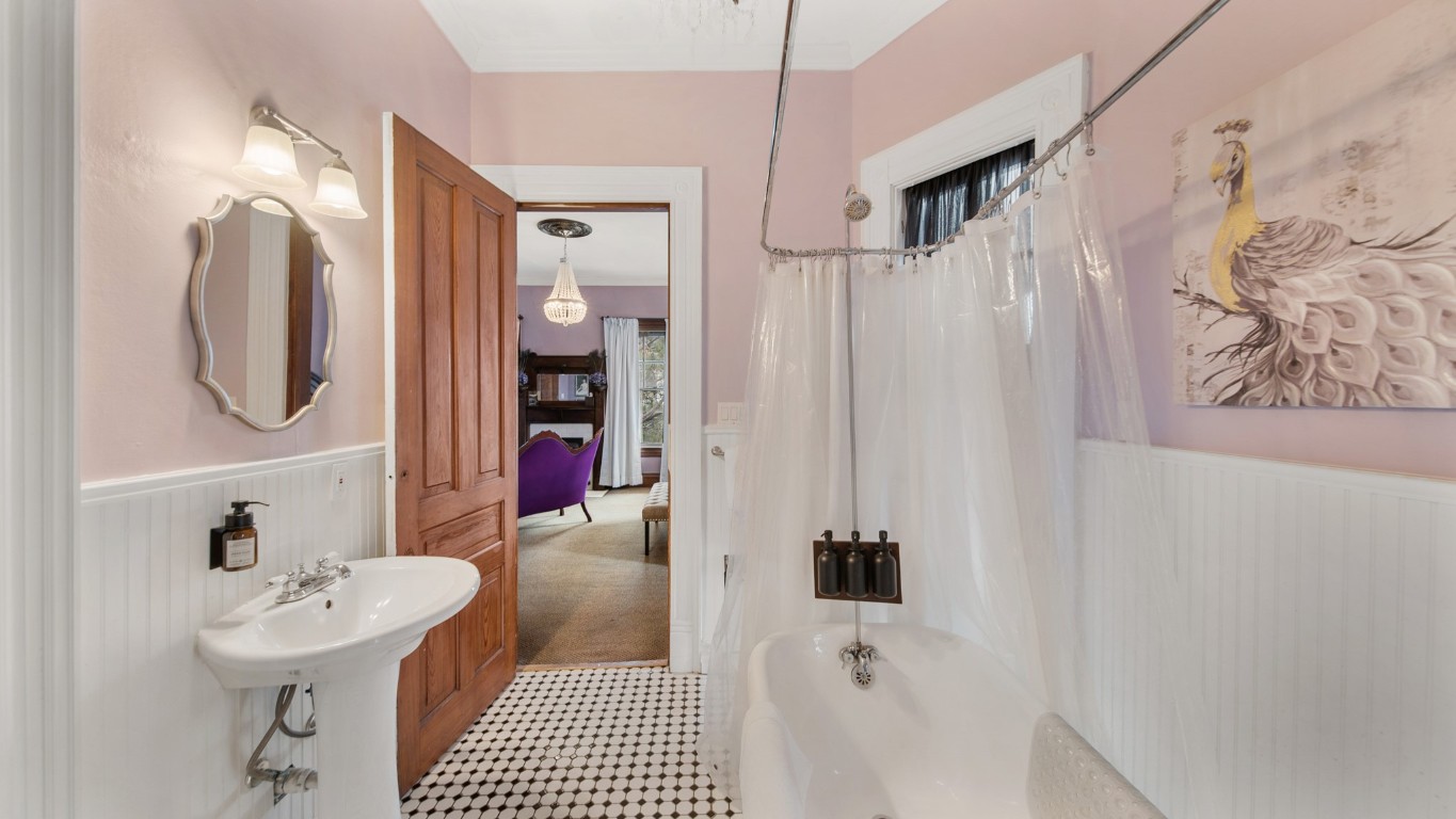 511 17th Street Galveston, TX 77550 - Photo 30 of 30 a bathroom with a sink a toilet and shower