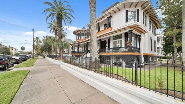 a view of a building with a swimming pool