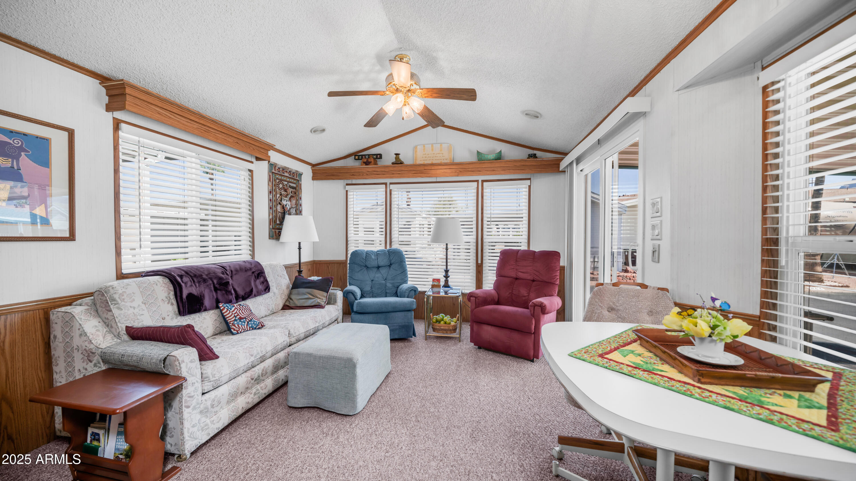 579 Jasper Drive, Unit 579 Apache Junction, AZ 85119 - Photo 1 of 56 a living room with furniture and a large window