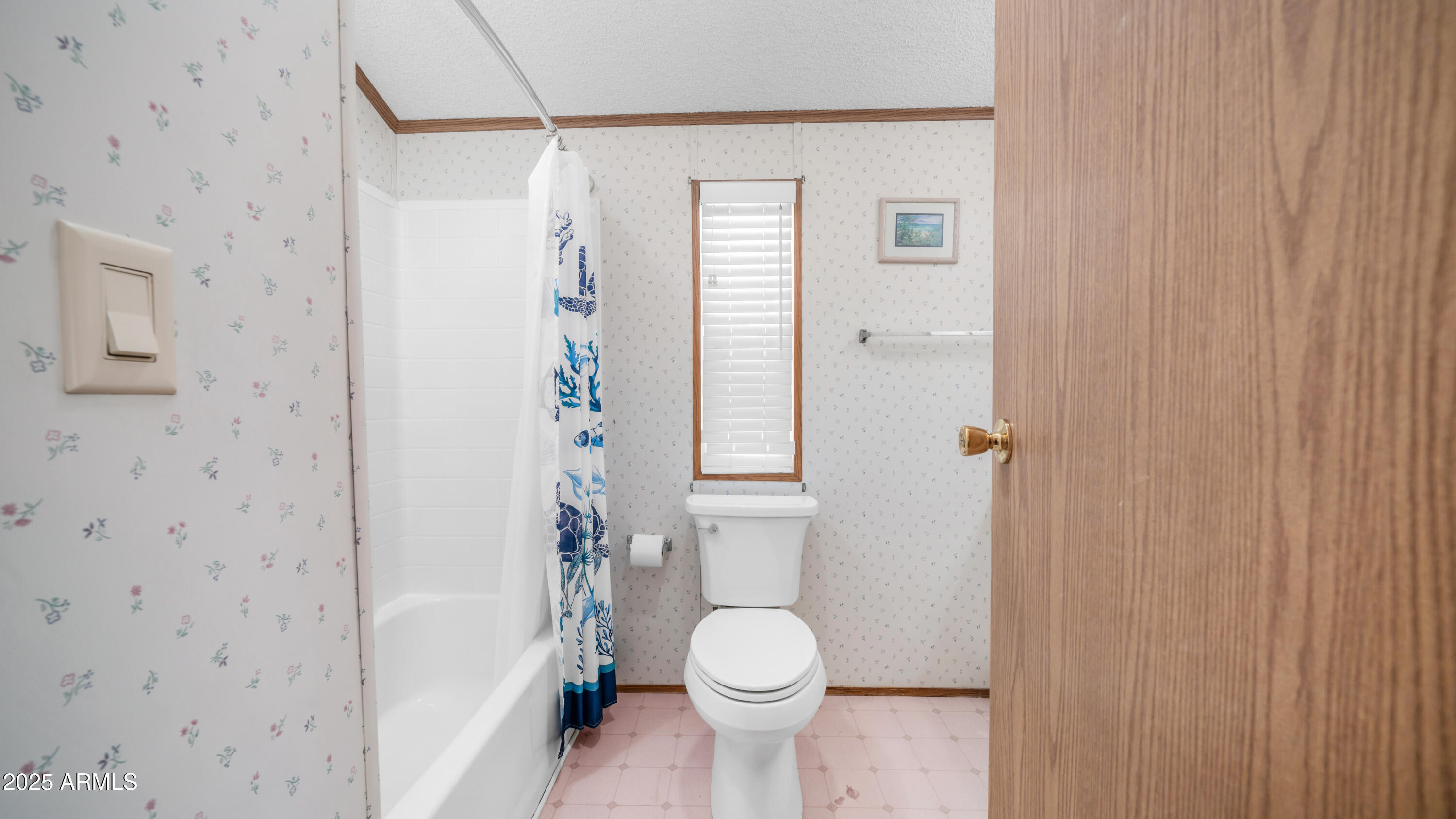 579 Jasper Drive, Unit 579 Apache Junction, AZ 85119 - Photo 17 of 56 a bathroom with a toilet and a shower