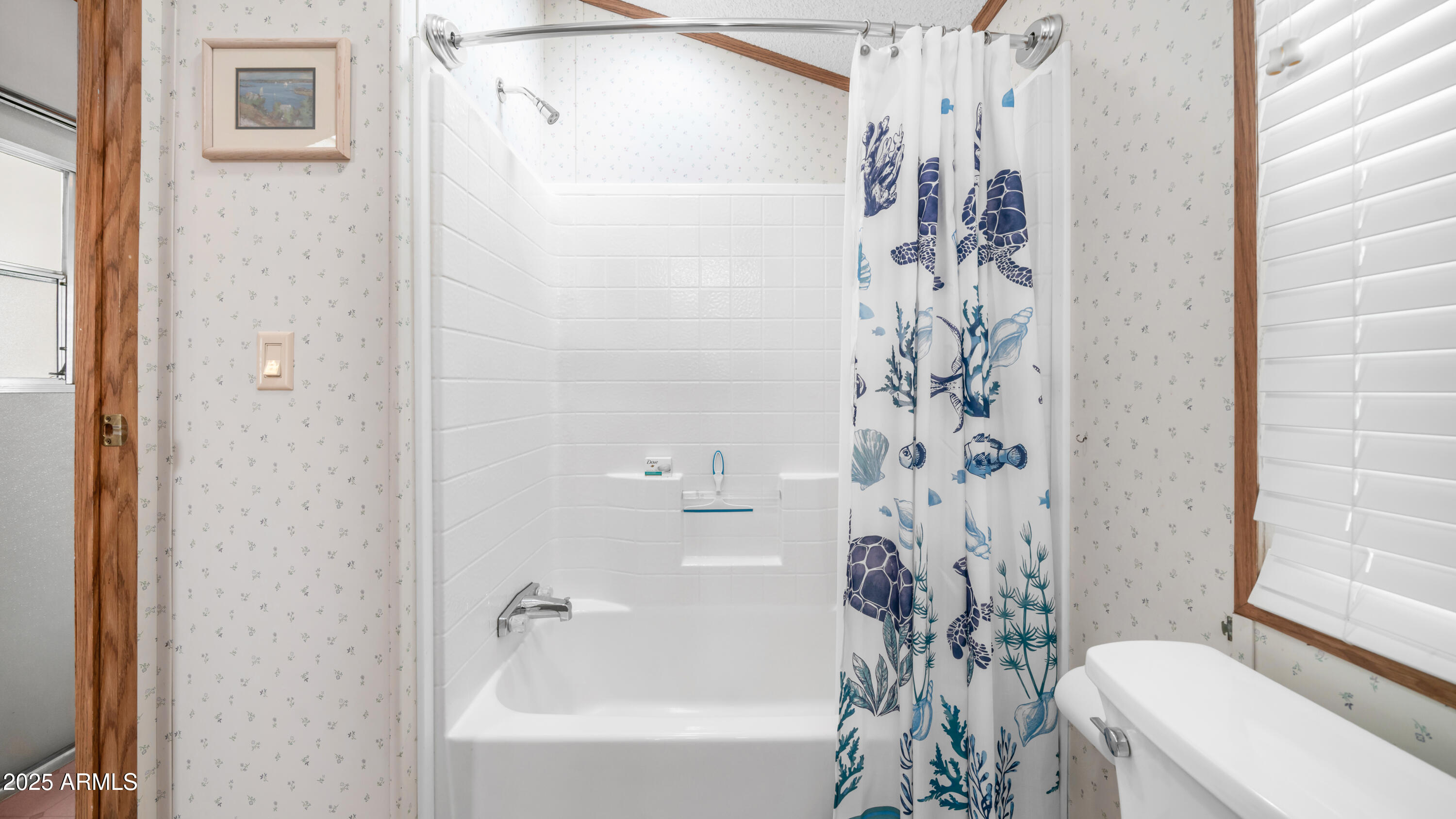 579 Jasper Drive, Unit 579 Apache Junction, AZ 85119 - Photo 19 of 56 a bathroom with a bathtub and shower
