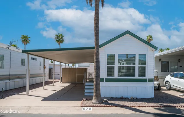 a view of entrance gate of the house