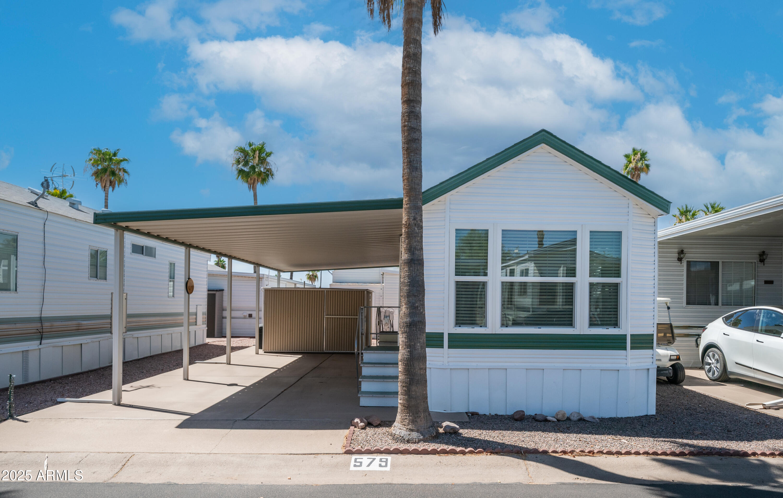 579 Jasper Drive, Unit 579 Apache Junction, AZ 85119 - Photo 2 of 56 a view of entrance gate of the house