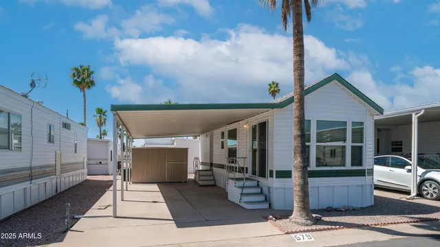 a view of house with outdoor sitting space