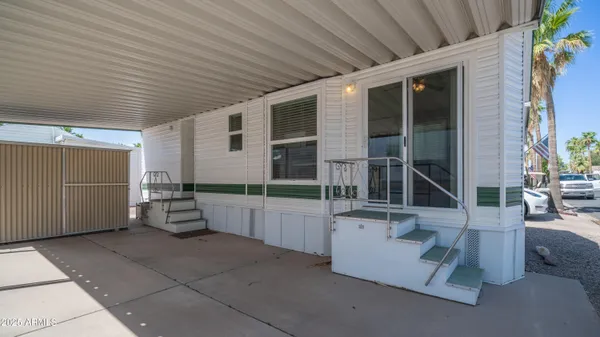 a view of a building with sitting area