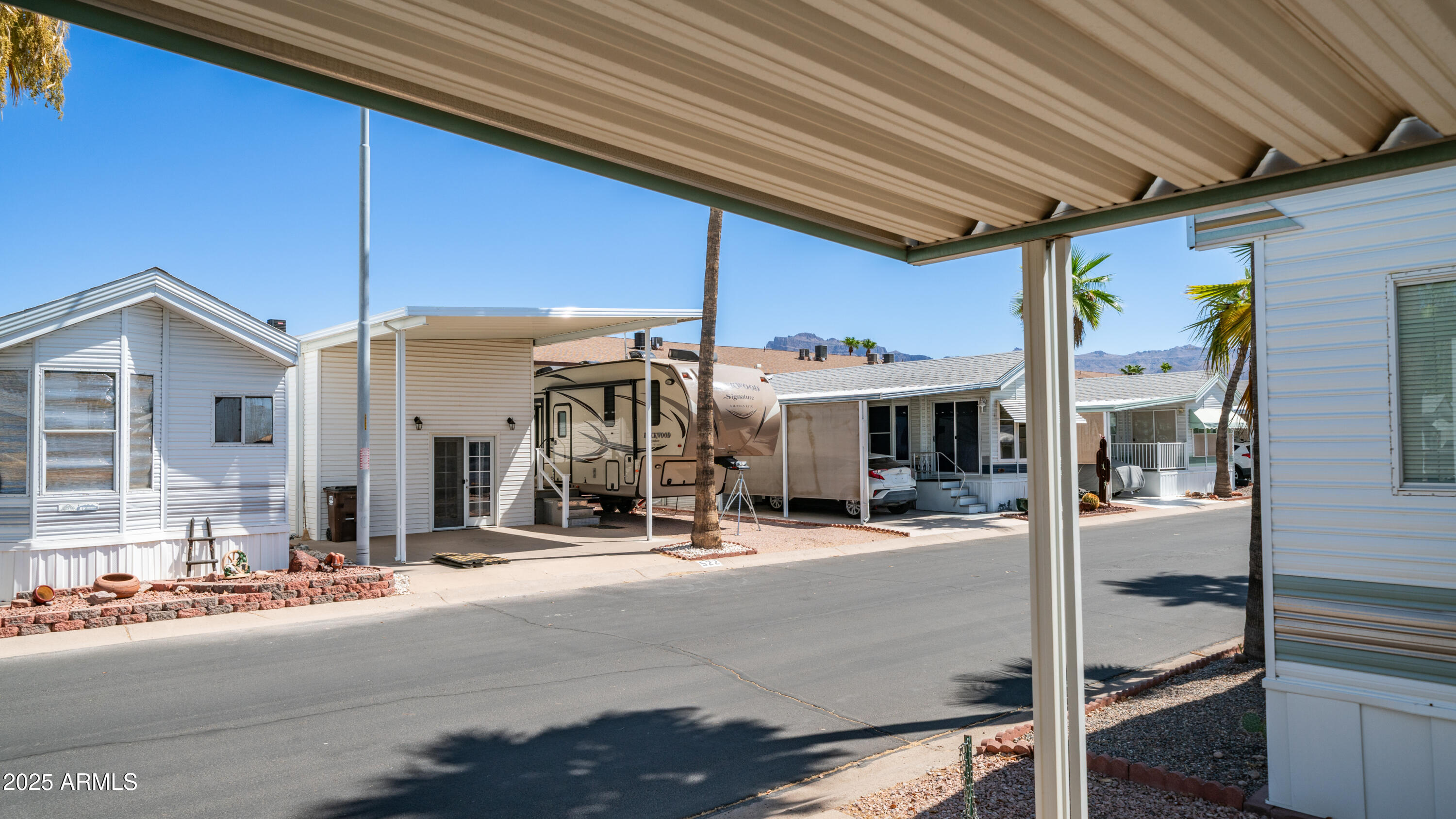 579 Jasper Drive, Unit 579 Apache Junction, AZ 85119 - Photo 6 of 56 a view of a building with sitting area