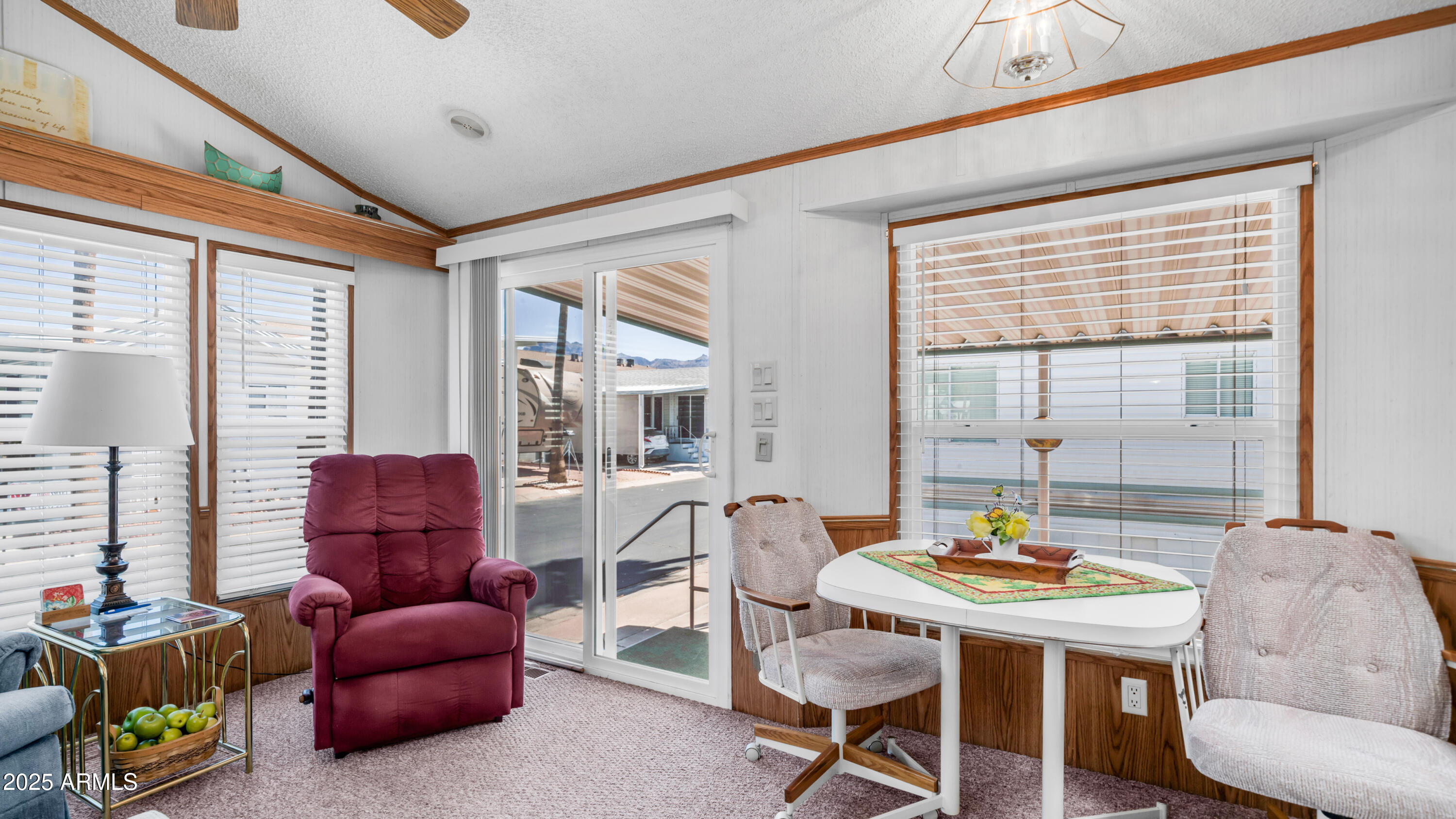 579 Jasper Drive, Unit 579 Apache Junction, AZ 85119 - Photo 8 of 56 a living room with furniture and a large window