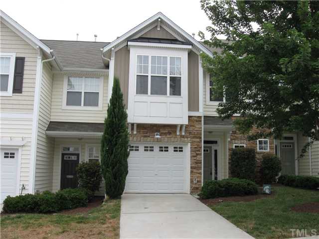 5916 Chivalry Court Raleigh, NC 27612 - Photo 1 of 25 Stone Front Townhome w/ 1-Car Garage