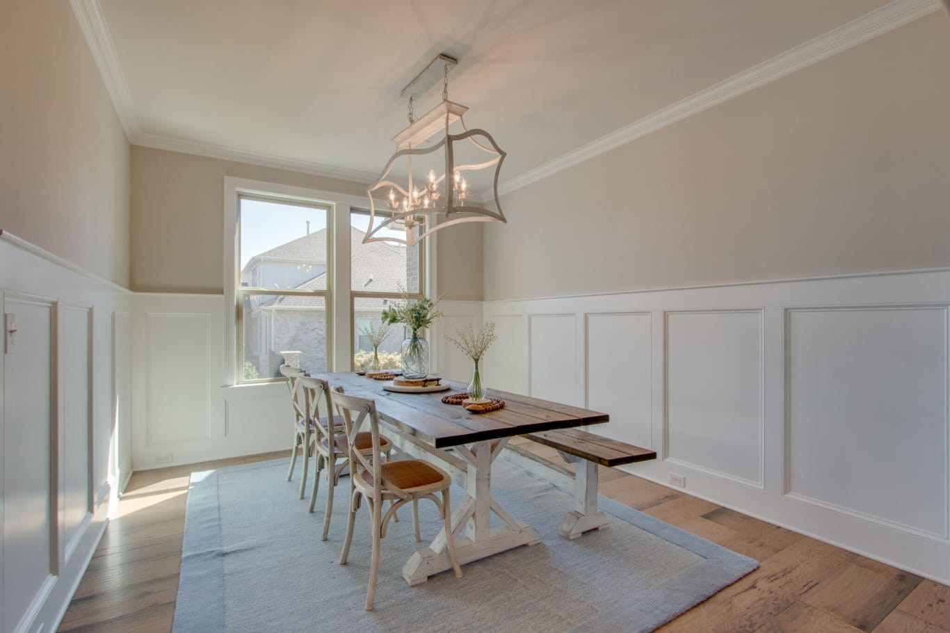 3584 Robbins Nest Road Thompson's Station, TN 37179 - Photo 12 of 43 a dining room with wooden floor a chandelier a wooden table and chairs