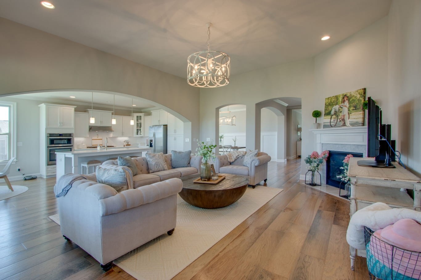 3584 Robbins Nest Road Thompson's Station, TN 37179 - Photo 15 of 43 a living room with fireplace furniture and a chandelier