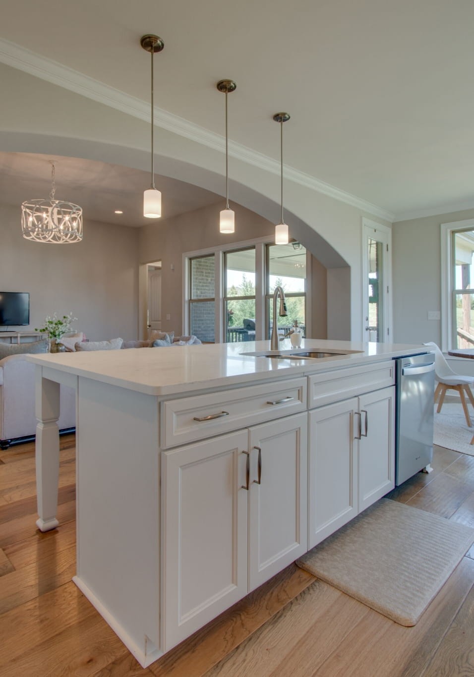 3584 Robbins Nest Road Thompson's Station, TN 37179 - Photo 20 of 43 a kitchen with kitchen island granite countertop a sink a counter space appliances and cabinets