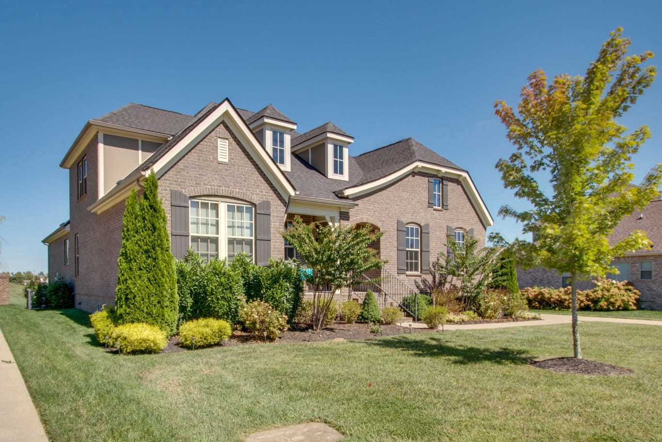 3584 Robbins Nest Road Thompson's Station, TN 37179 - Photo 2 of 43 a front view of a house with a yard