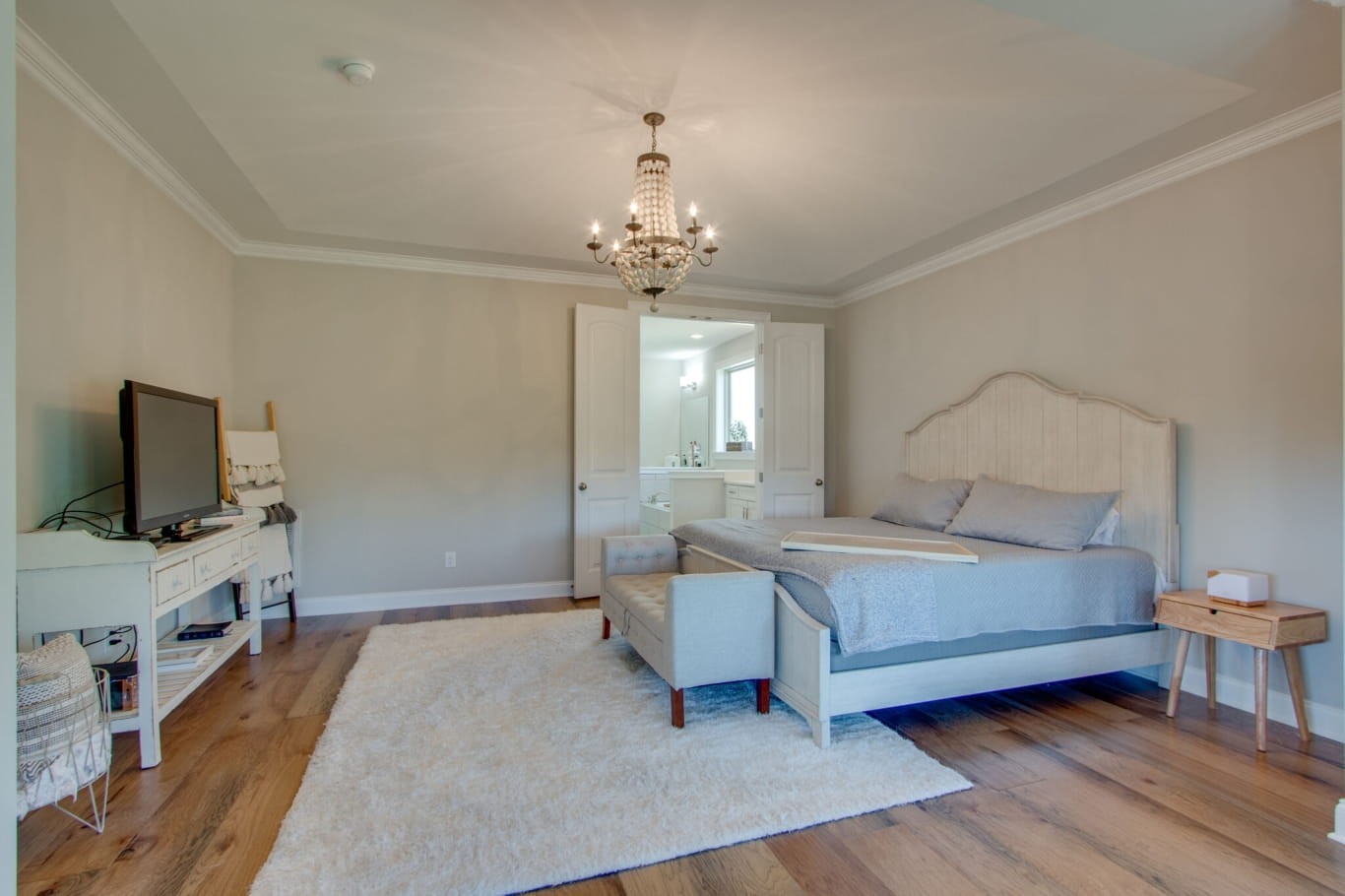 3584 Robbins Nest Road Thompson's Station, TN 37179 - Photo 22 of 43 a bedroom with a bed and a flat screen tv