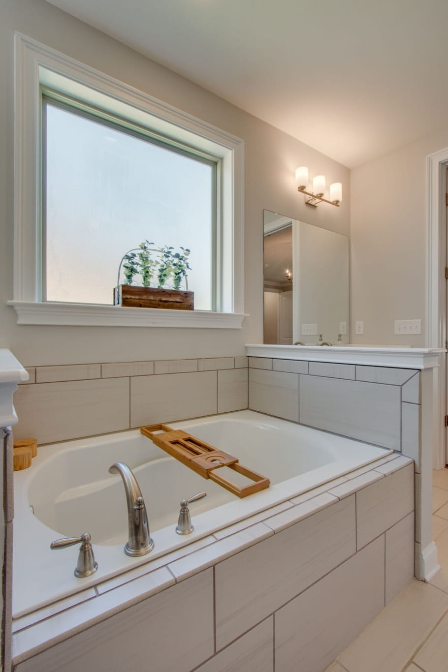 3584 Robbins Nest Road Thompson's Station, TN 37179 - Photo 25 of 43 a bathroom with a sink and a mirror