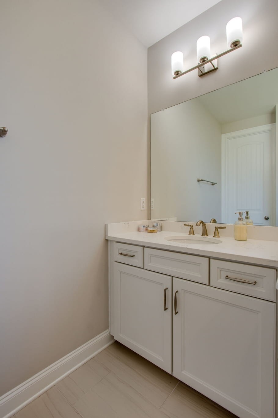 3584 Robbins Nest Road Thompson's Station, TN 37179 - Photo 26 of 43 a bathroom with a sink and a mirror