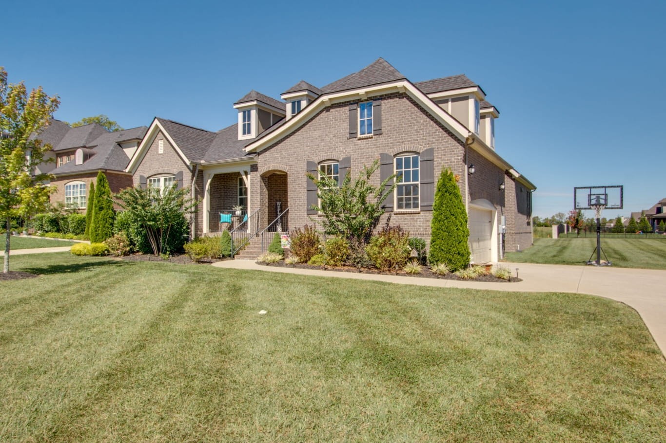 3584 Robbins Nest Road Thompson's Station, TN 37179 - Photo 3 of 43 a front view of a house with a yard