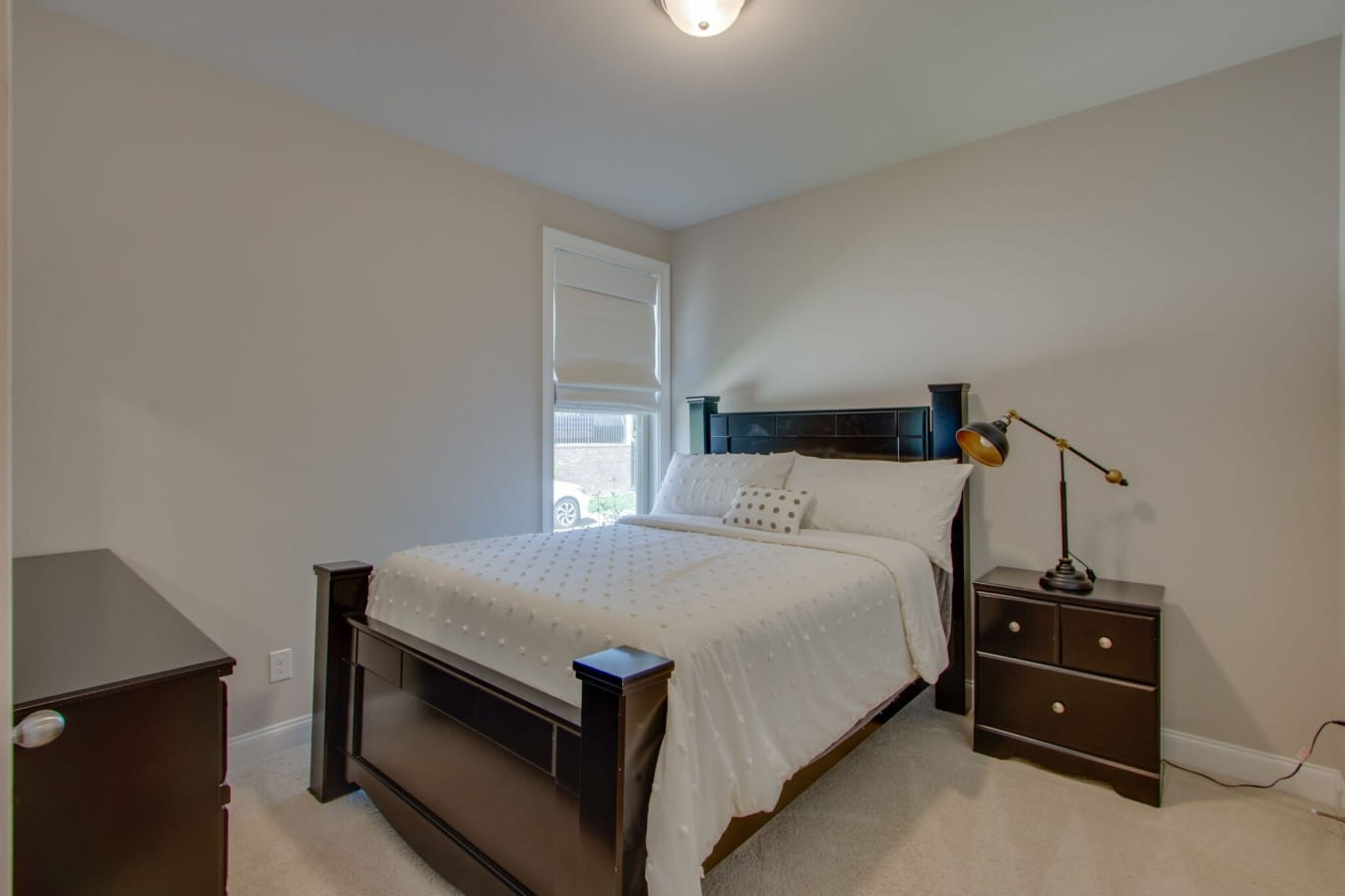 3584 Robbins Nest Road Thompson's Station, TN 37179 - Photo 32 of 43 a bedroom with a bed and a window