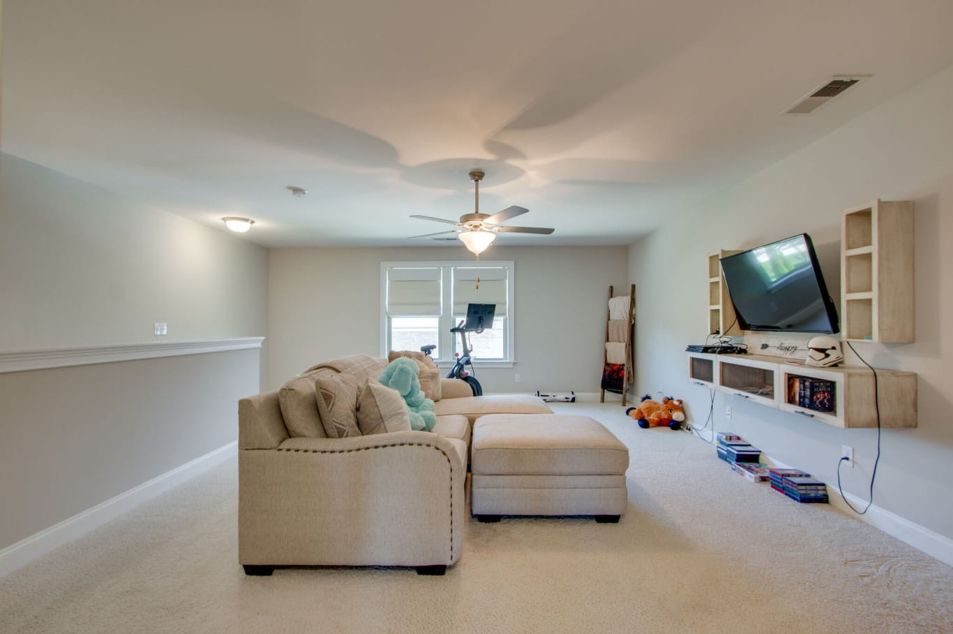 3584 Robbins Nest Road Thompson's Station, TN 37179 - Photo 35 of 43 a living room with furniture and a flat screen tv