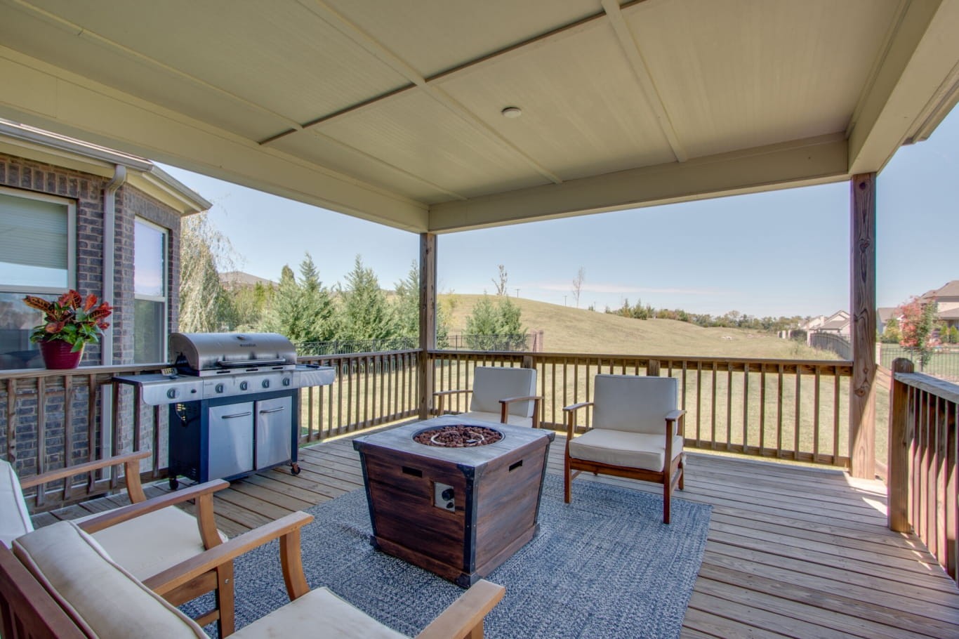 3584 Robbins Nest Road Thompson's Station, TN 37179 - Photo 40 of 43 a living room with furniture a rug and a floor to ceiling window
