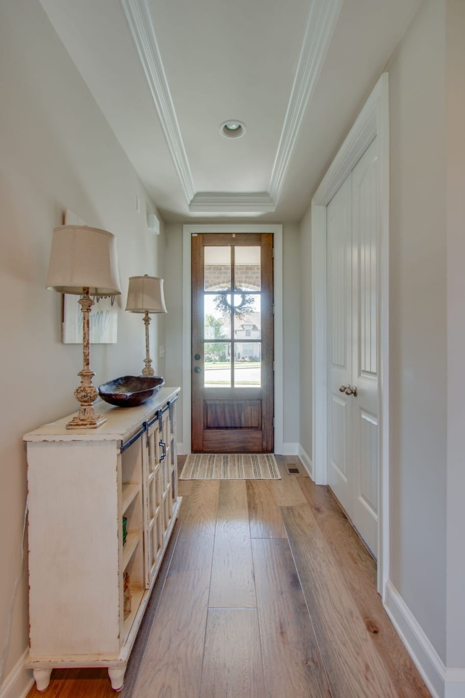 3584 Robbins Nest Road Thompson's Station, TN 37179 - Photo 8 of 43 a kitchen with stainless steel appliances granite countertop a stove and a refrigerator