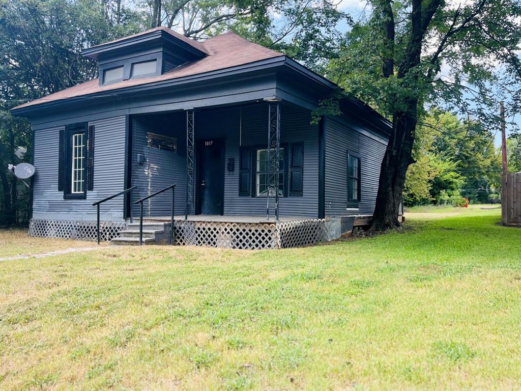 1037 Cedar Street Paris, TX 75460 - Photo 2 of 13 a view of a house with swimming pool