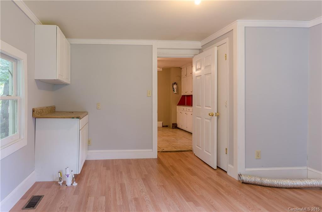 2904 Tuckaseegee Road Charlotte, NC 28208 - Photo 21 of 21 a view of small space with wooden floor and closet