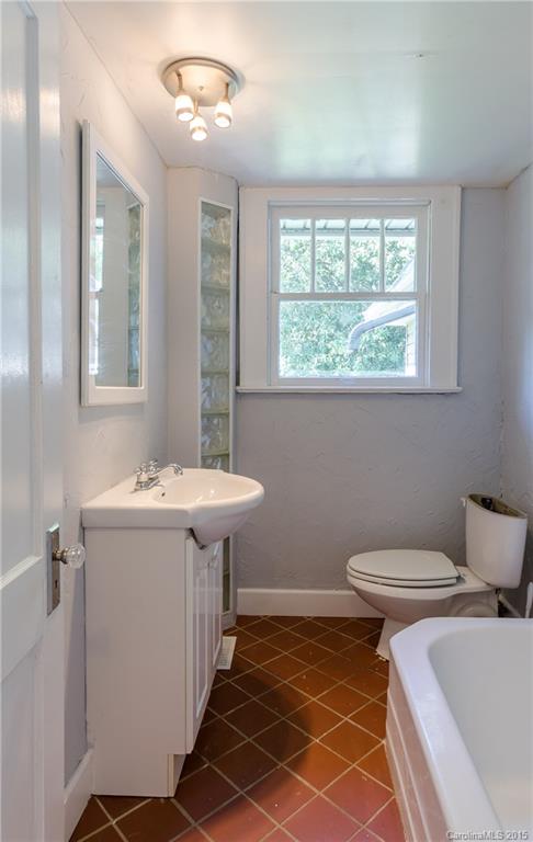 2904 Tuckaseegee Road Charlotte, NC 28208 - Photo 9 of 21 a bathroom with a sink and a toilet