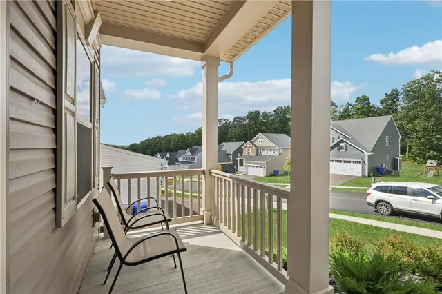 a view of a two chair in the balcony