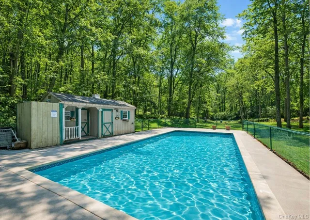 a front view of a house with yard