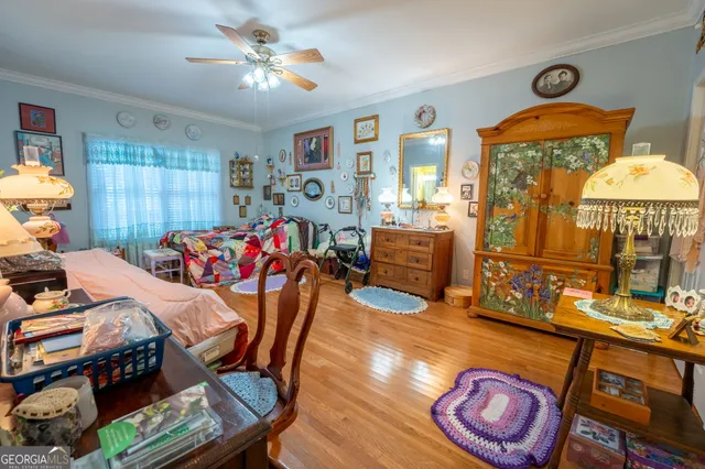 a bedroom with furniture and a bed