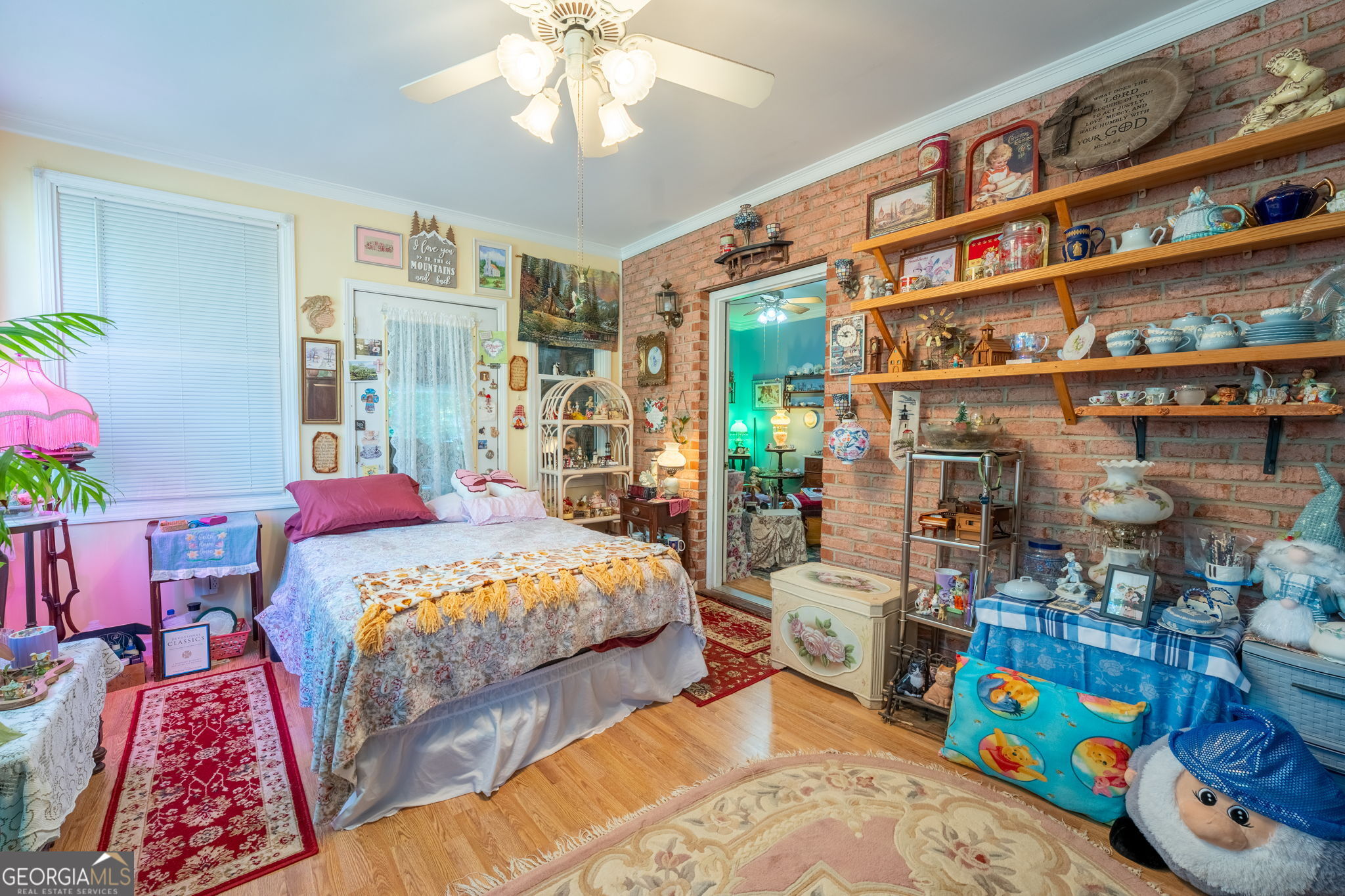 50 Green Hill Place Toccoa, GA 30577 - Photo 23 of 38 a bedroom with bed and a bookshelf