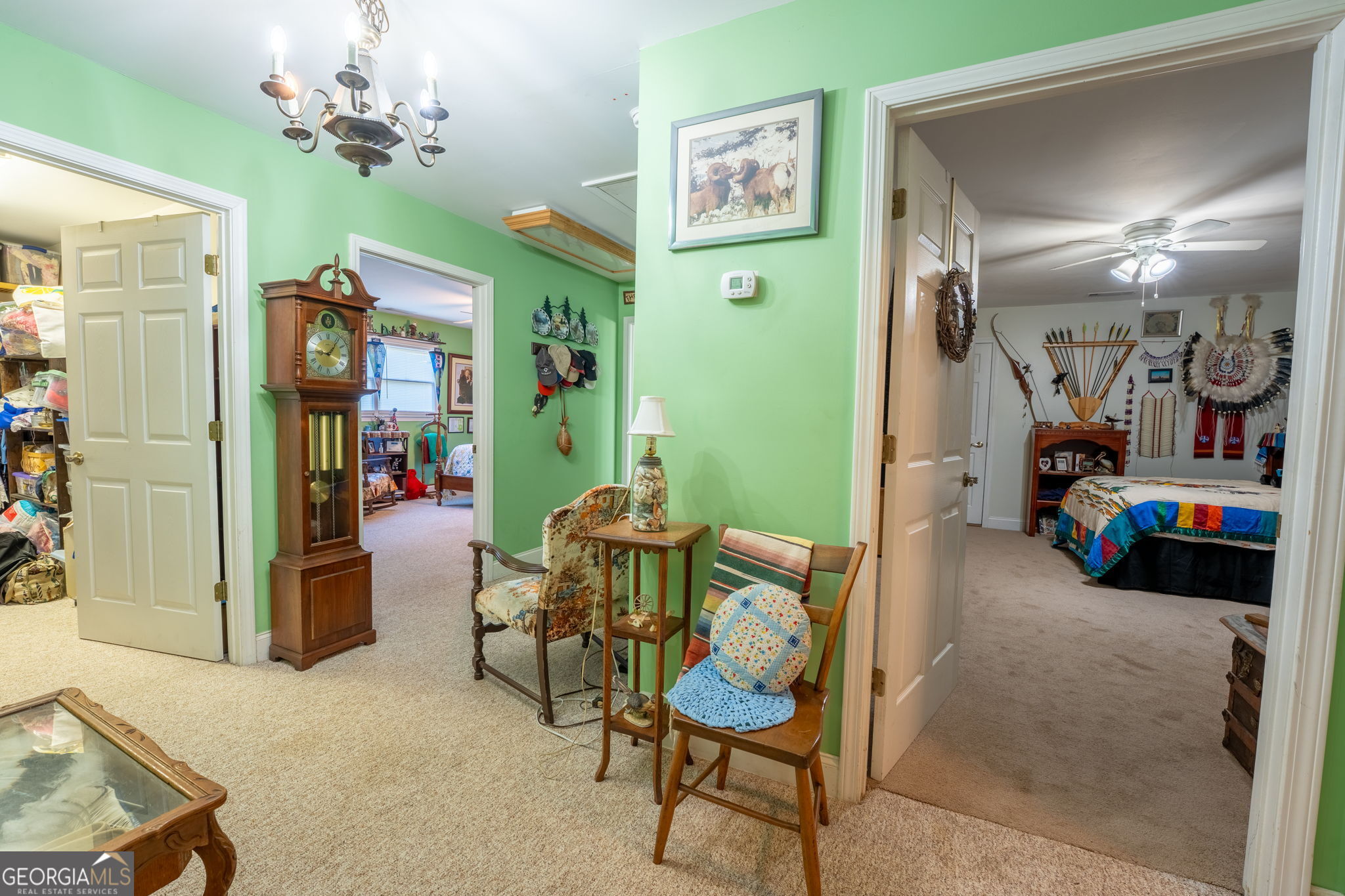 50 Green Hill Place Toccoa, GA 30577 - Photo 26 of 38 a living room with furniture and a chandelier